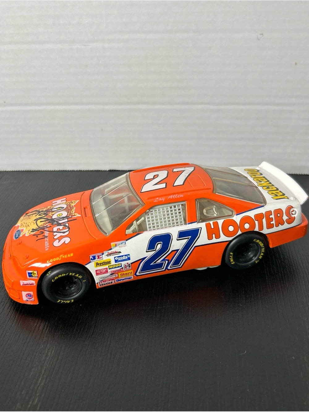 NASCAR autographed Hooters No.27 Orange Die-Cast Race Car collectible Loy Allen
